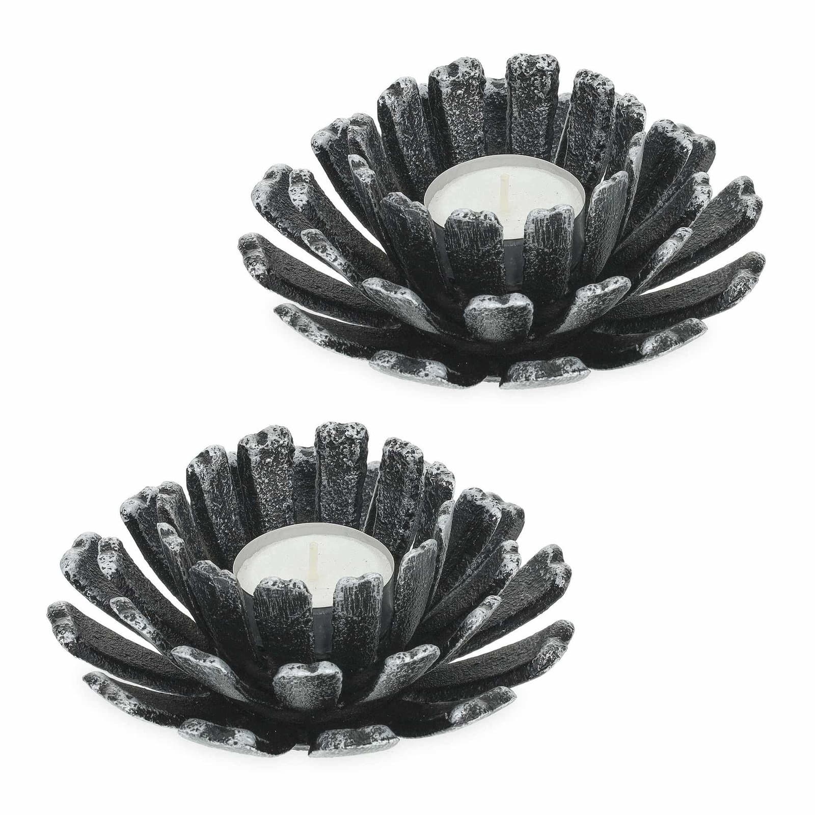 sett med 2 blomsterformede telysholdere