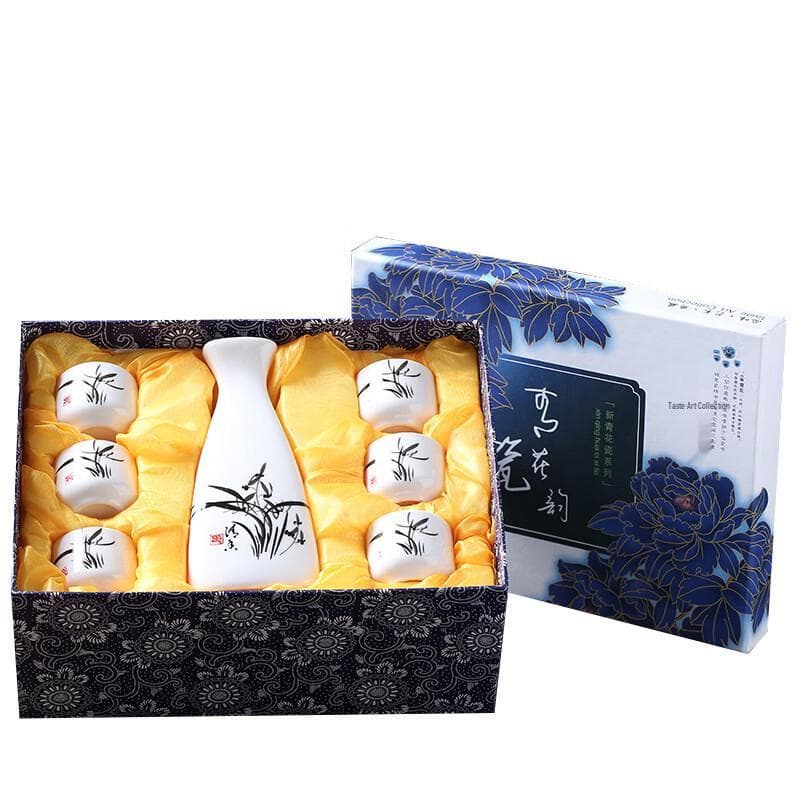 Japansk keramisk sake-sett med seks kopper