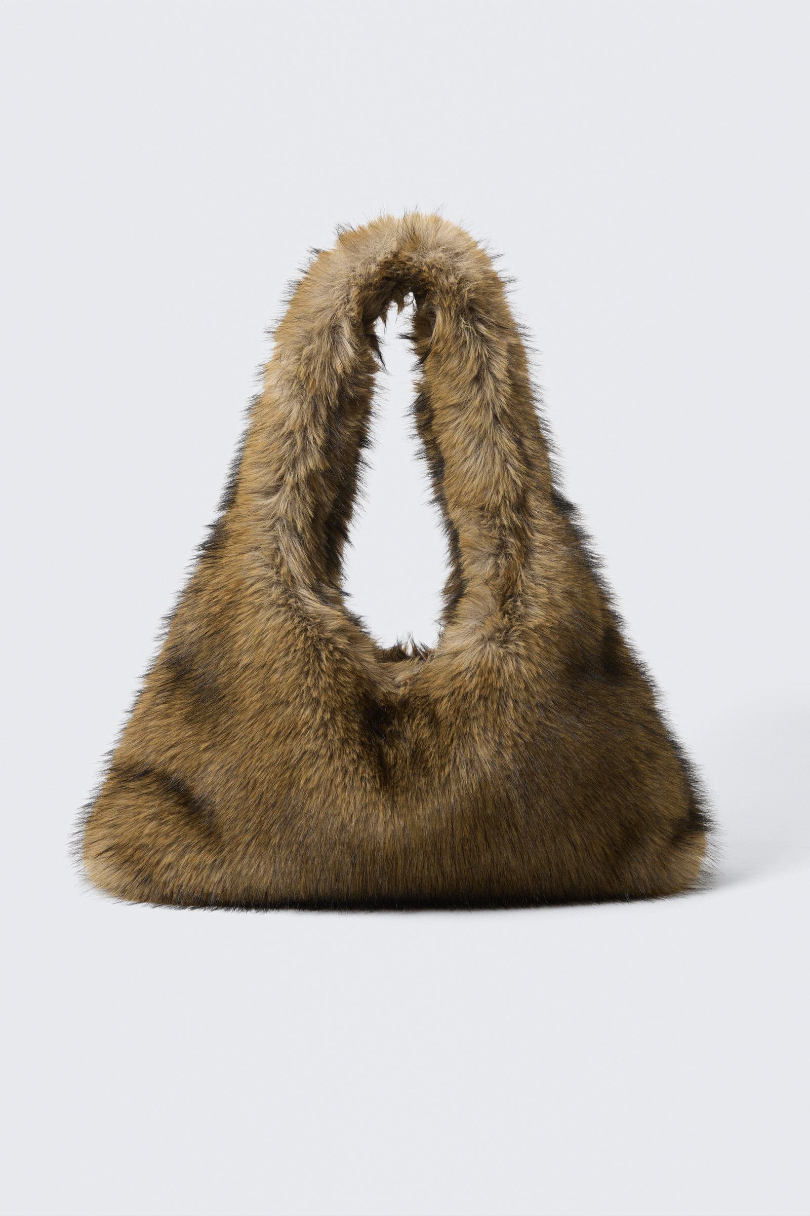 Slouchy skulderveske i fuskepels