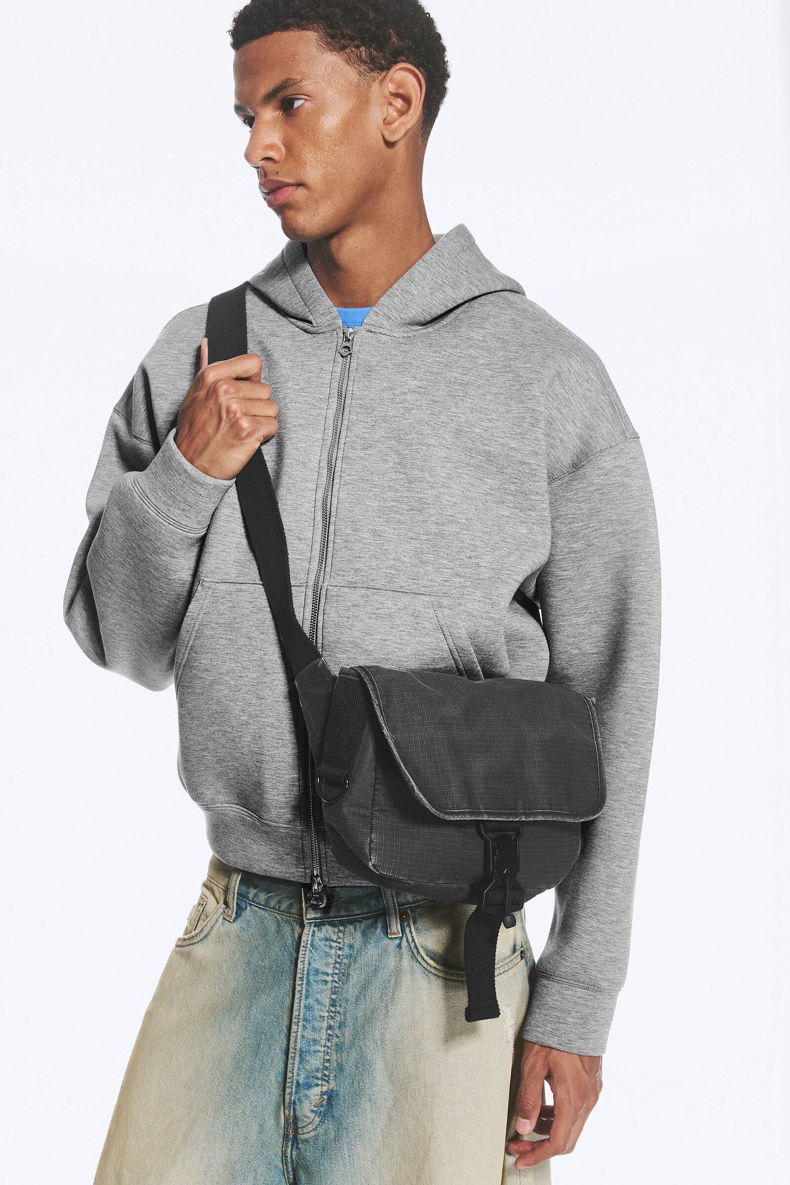 Crossbody Budbringerveske