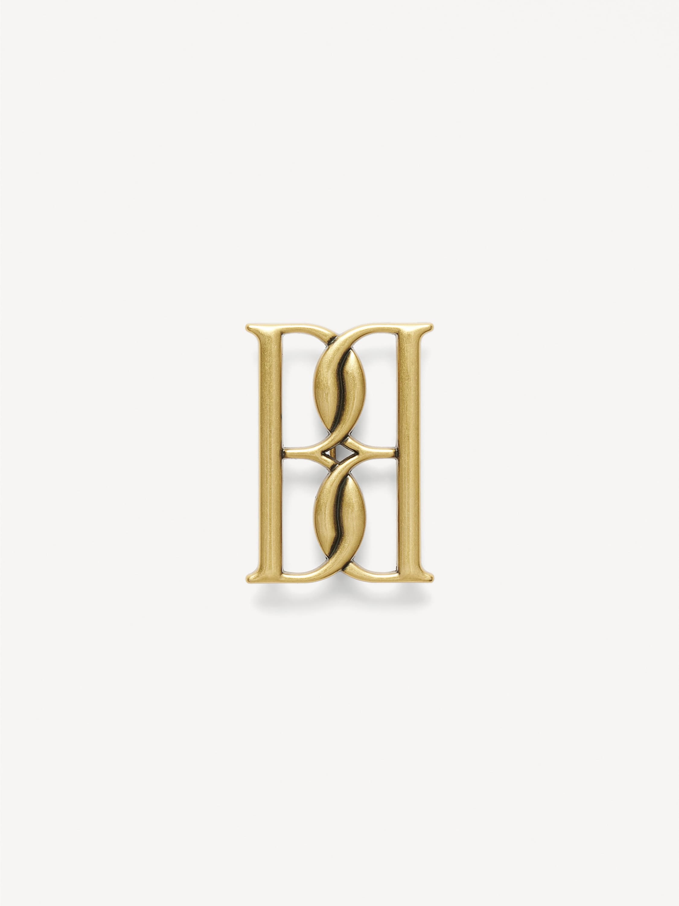 Mono small gold-tone brooch