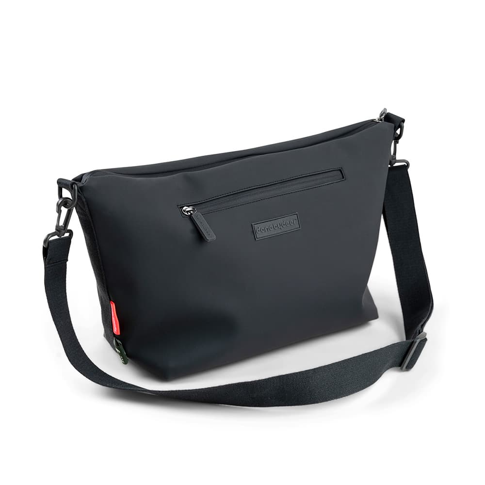 Done by Deer barnevogn bag sort